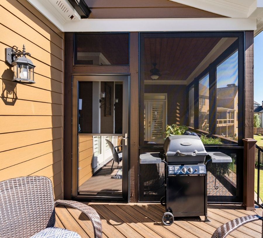 Screened Porch with Grill and Outdoor Seating Screened Porch with Grill and Outdoor Seating