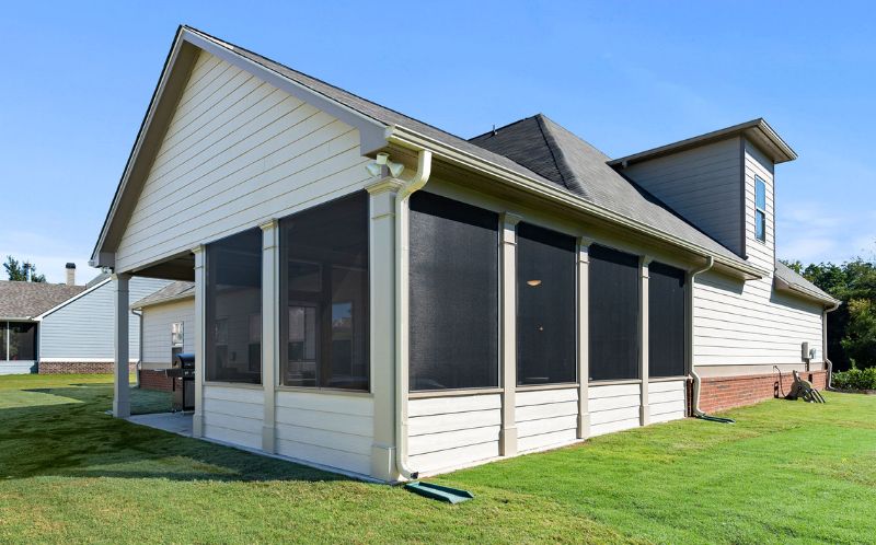 Backyard View Of A Screened-in Porch