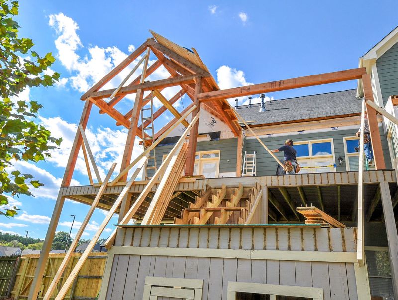 House Under Construction With Wooden Framing